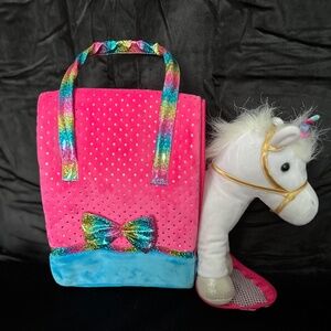 Pet in a bag, travel bag with white unicorn stuffy.